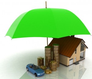 Car, stacks of gold coins, and a house under a large umbrella